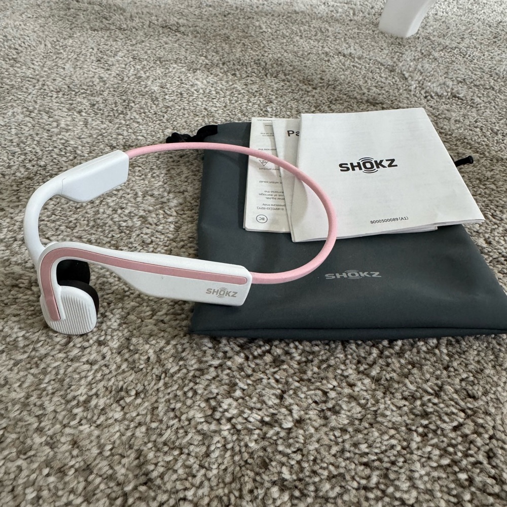 Shokz Pink and White Earbud Headphones